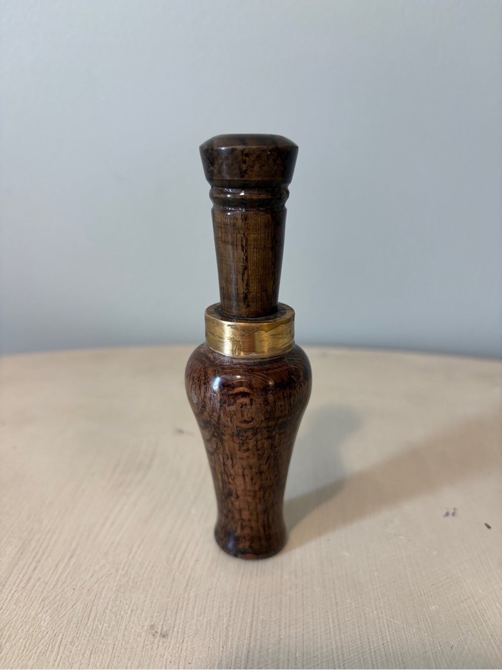 Hand crafted wooden Louisiana soft call duck with a double reed.